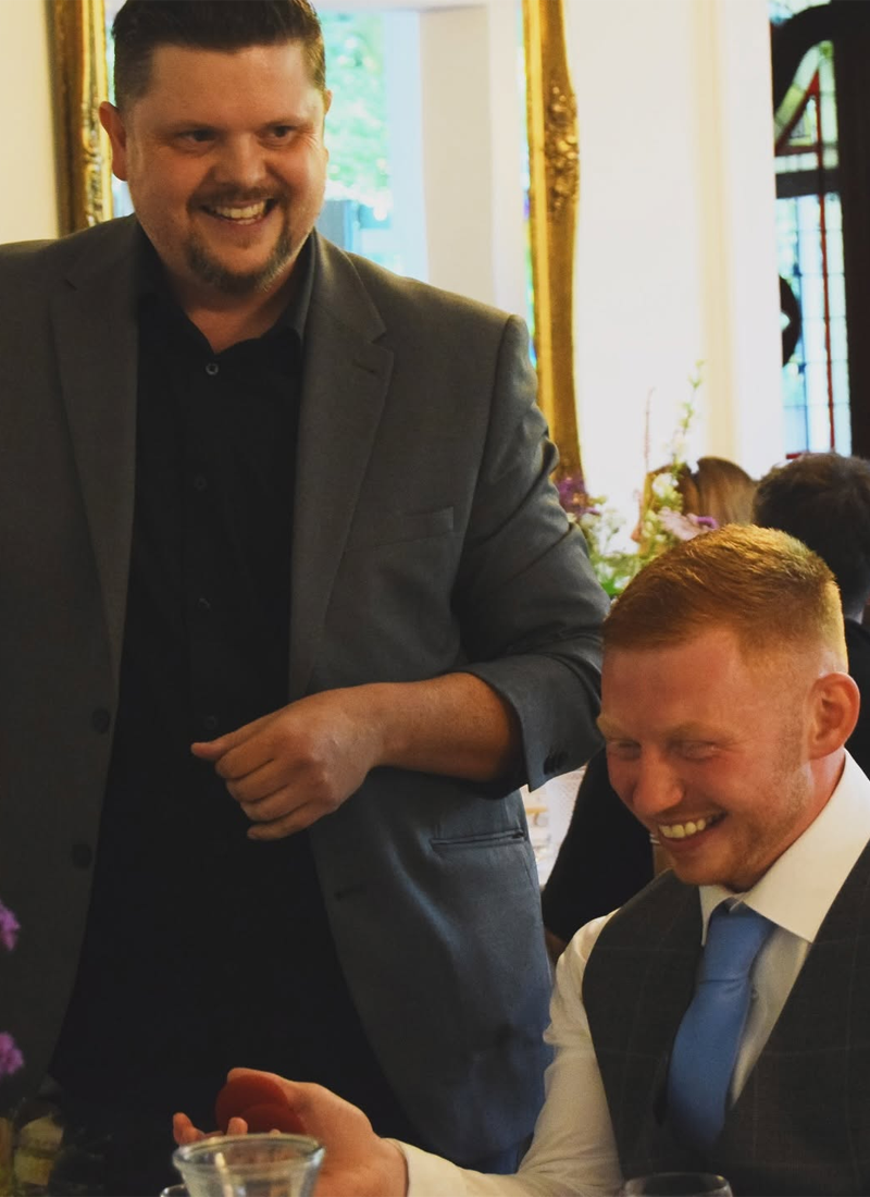 Close-up magician performing interactive magic