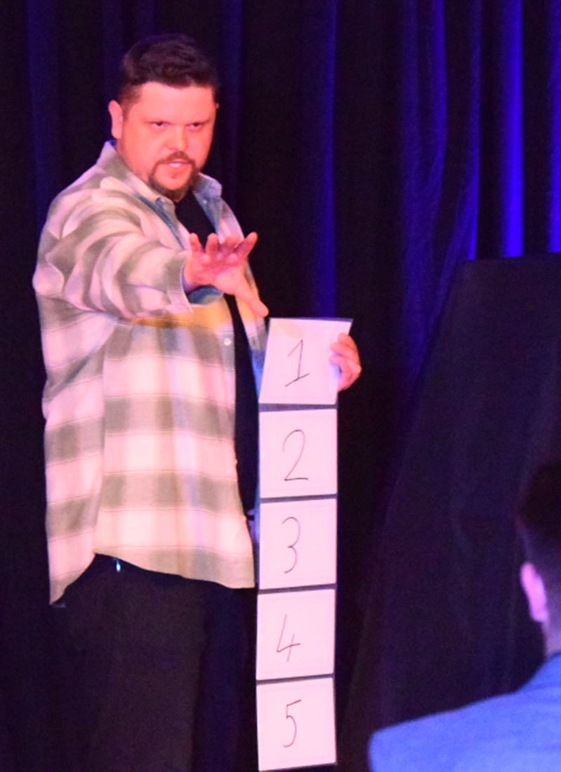 Mark Roberts entertaining guests at a corporate event