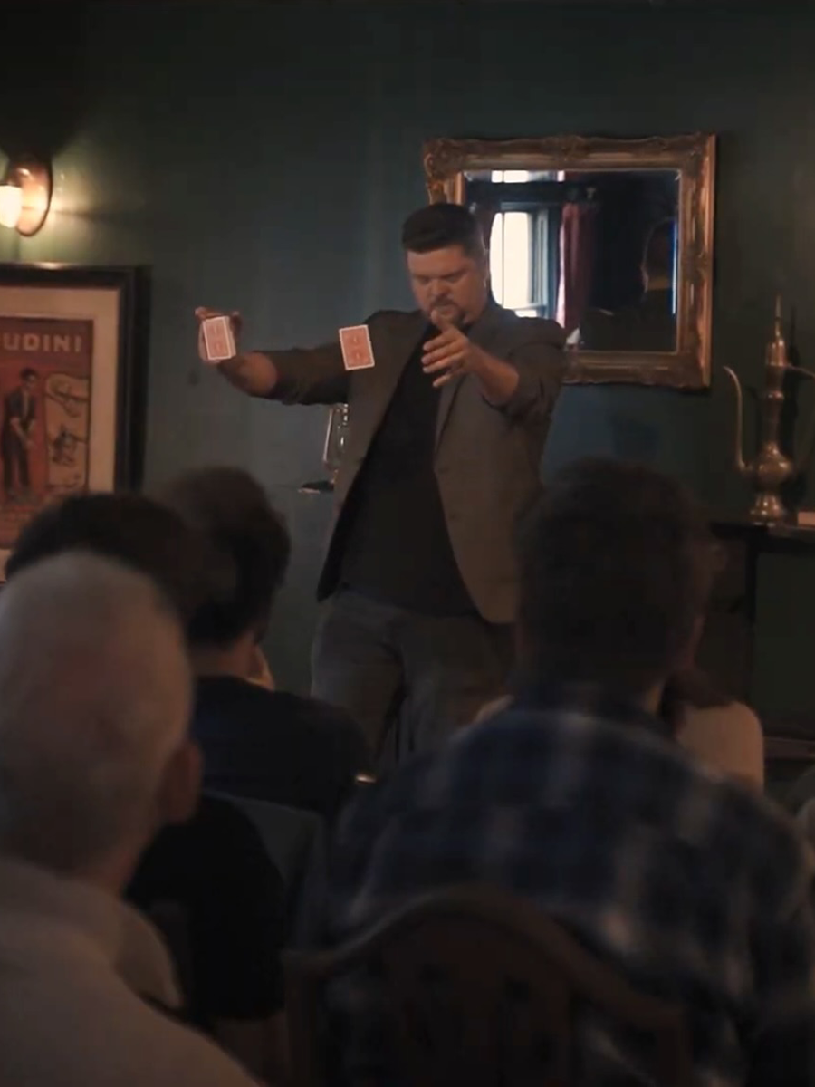 Mark Roberts performing an intimate live magic show